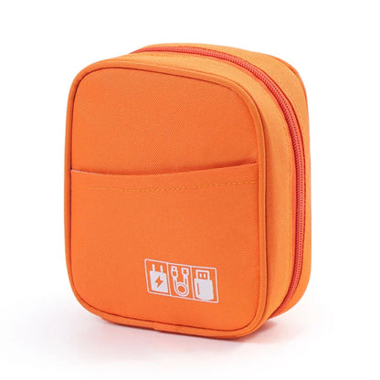 Étui compact pour câbles USB et écouteurs avec fermeture éclair ouverte