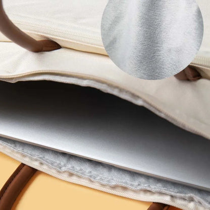 Variations de couleurs noir, gris et beige du sac à bandoulière pour ordinateur portable